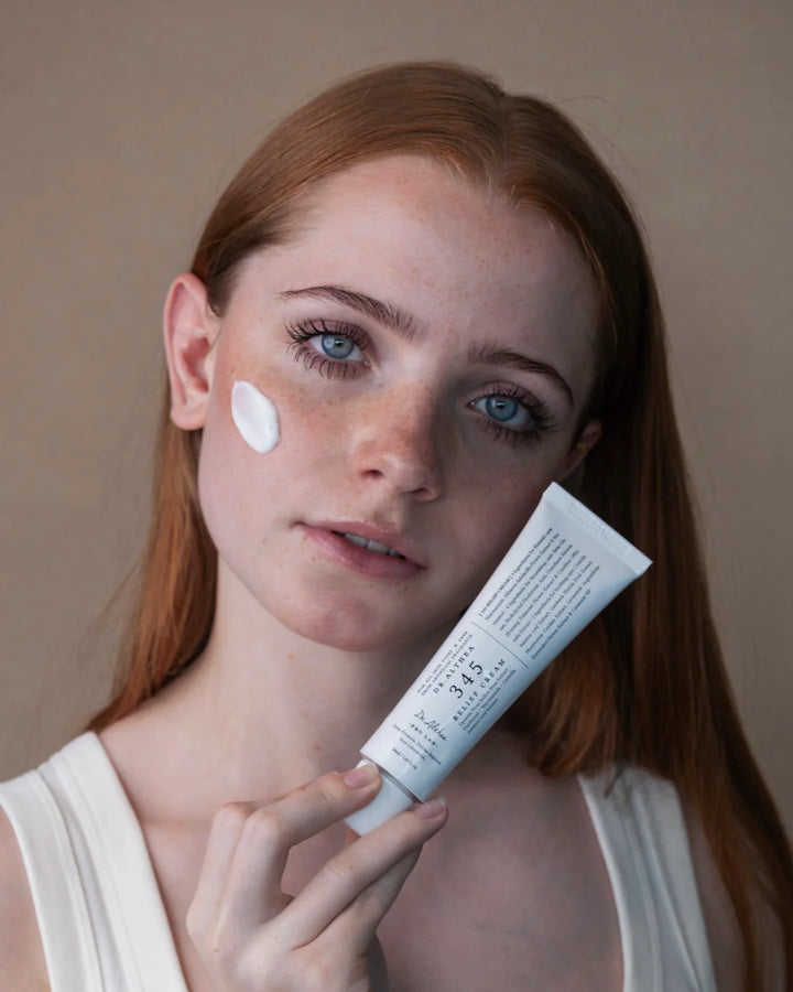 Nuaglow skincare routine for sensitive skin and redness, featuring soothing creams and serums in a calming arrangement.