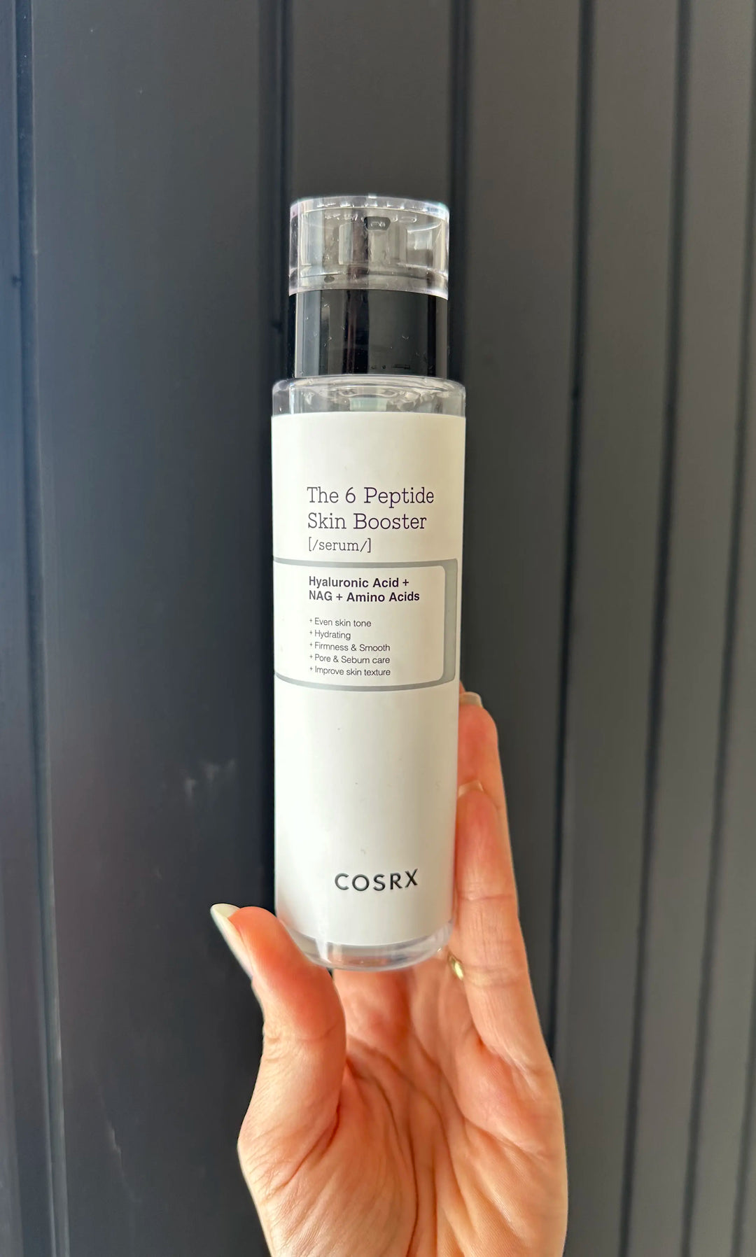 COSRX The 6 Peptide Skin Booster Serum toner bottle with a pump dispenser, showing the 150 ml packaging.