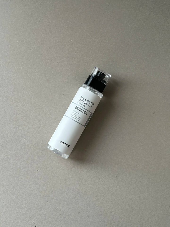 COSRX The 6 Peptide Skin Booster Serum toner bottle with pump dispenser, 150ml, showing the product label and packaging.