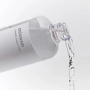 Nuaglow Centella Asiatica toner for sensitive skin, in a clear bottle with a minimalist label, suitable for calming skincare routines.