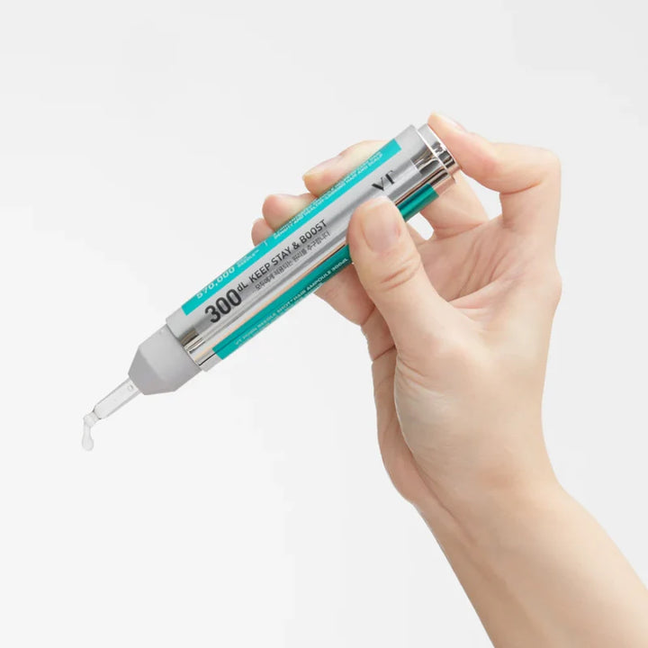 VT Cosmetics PDRN Reedle Shot Hair Ampoule in a glass bottle, designed for hair care and scalp nourishment.