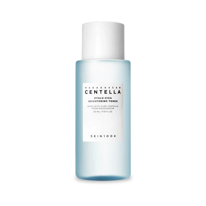 SKIN1004 Hyalu-Cica Brightening Toner in a 210ml bottle, featuring a clear liquid with a minimalist label and pump dispenser.