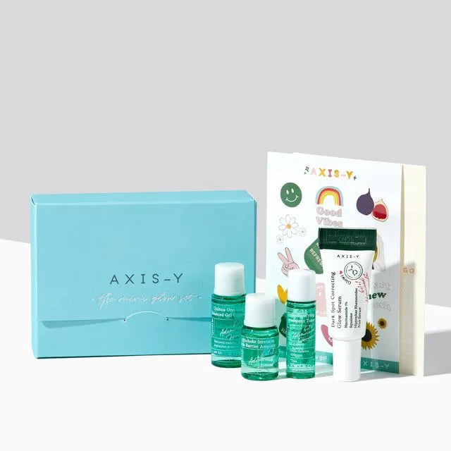 Mini Glow Set by AXIS-Y featuring travel-sized skincare products in sleek containers.