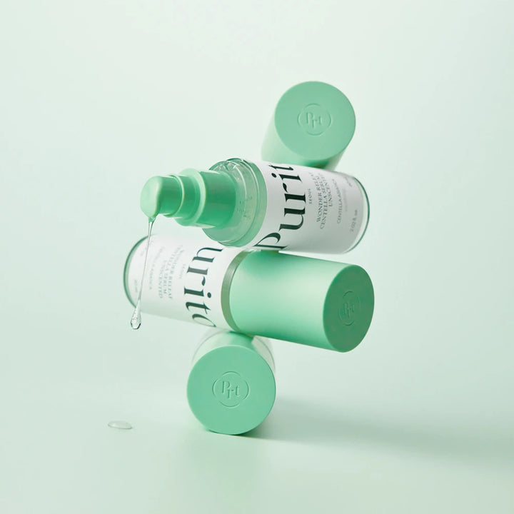 Purito Wonder Releaf Centella Serum Unscented in 60ml bottle, clear glass container with dropper for skincare application.